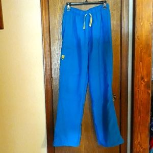 Spread good cheer scrub pants